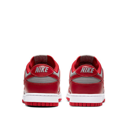 NIKE DUNK LOW RETRO "MEDIUM GREY VARSITY RED" UNLV (2021)